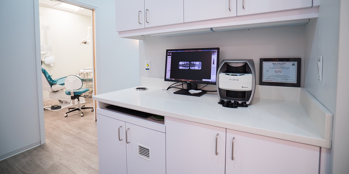 computer screen on counter with digital x-ray machine